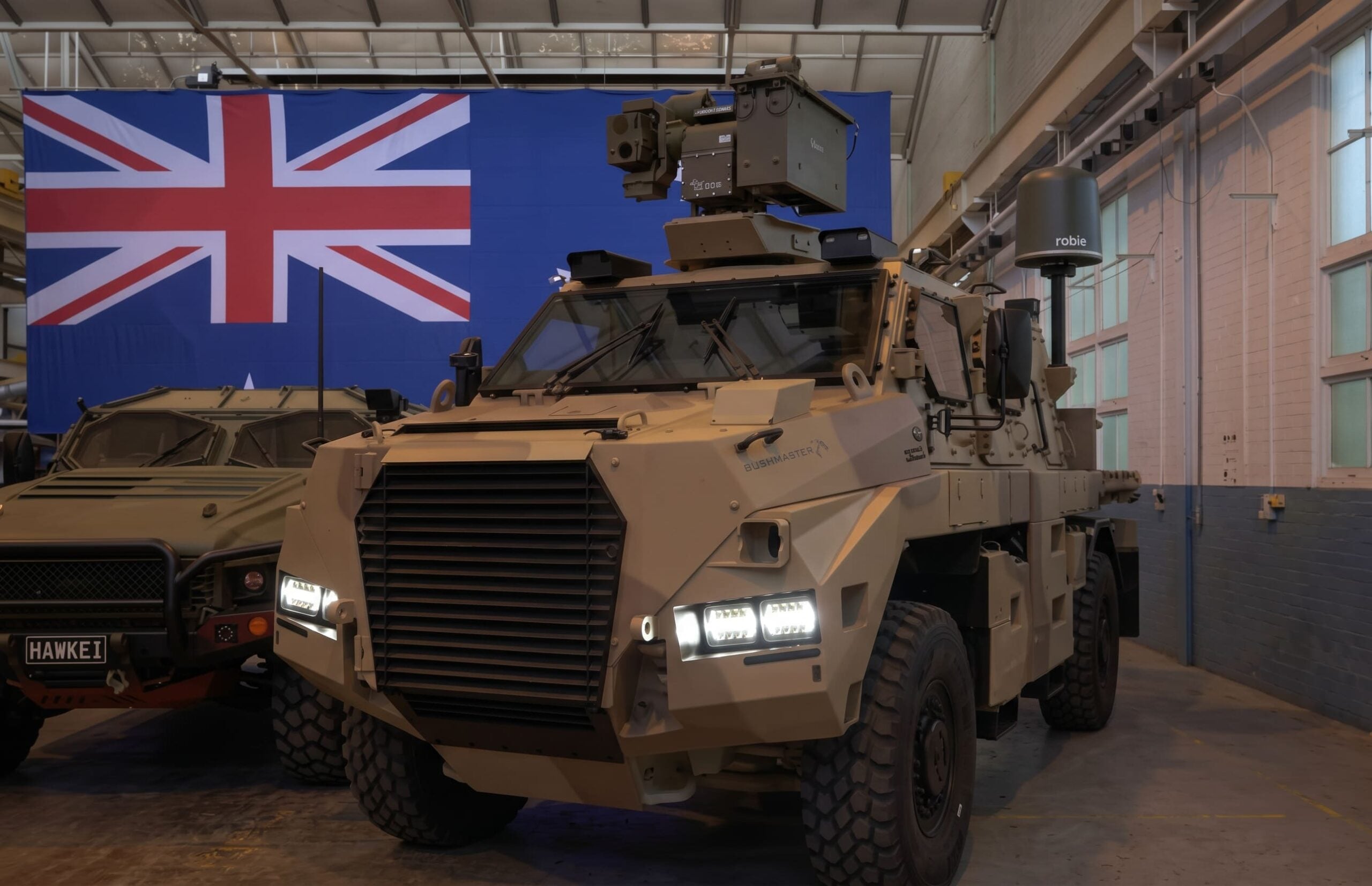 Thales Bushmaster Dual Cab Gets C-UAS Rockets and 100 km Loitering Munitions